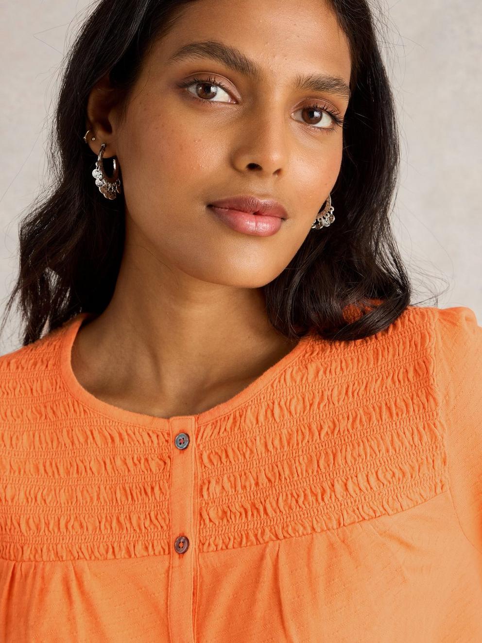 DANIELLA SHIRRED TOP in MID ORANGE - MODEL DETAIL