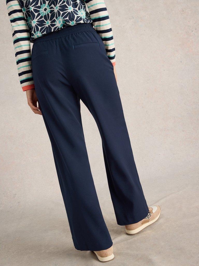 Freda Wide Leg Trousers in DARK NAVY - MODEL BACK