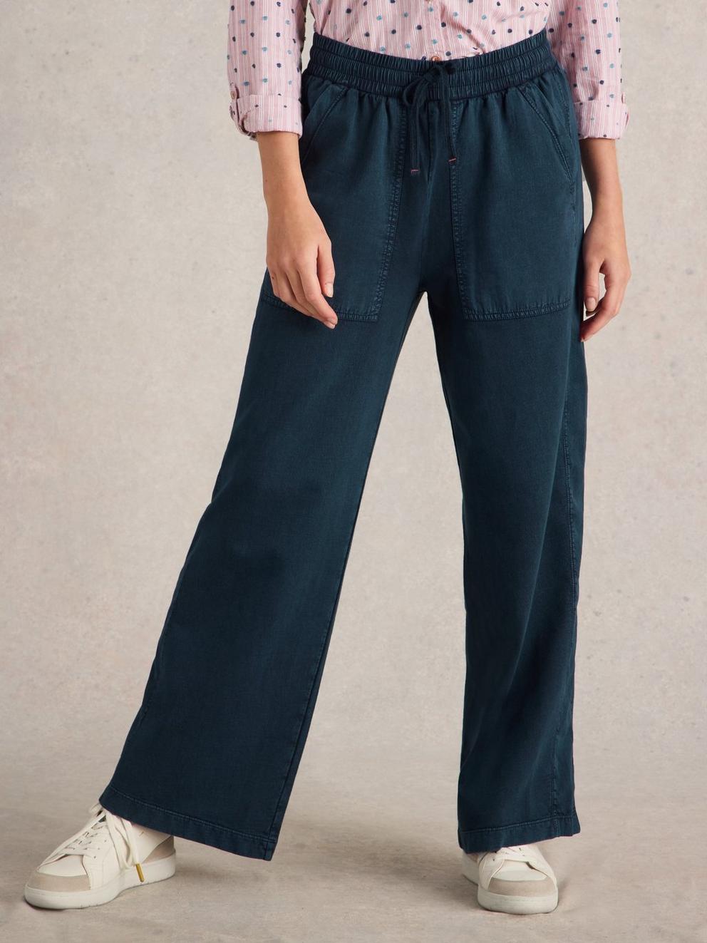 Ava Wide Leg Jersey Jogger  in MID DENIM - MODEL FRONT