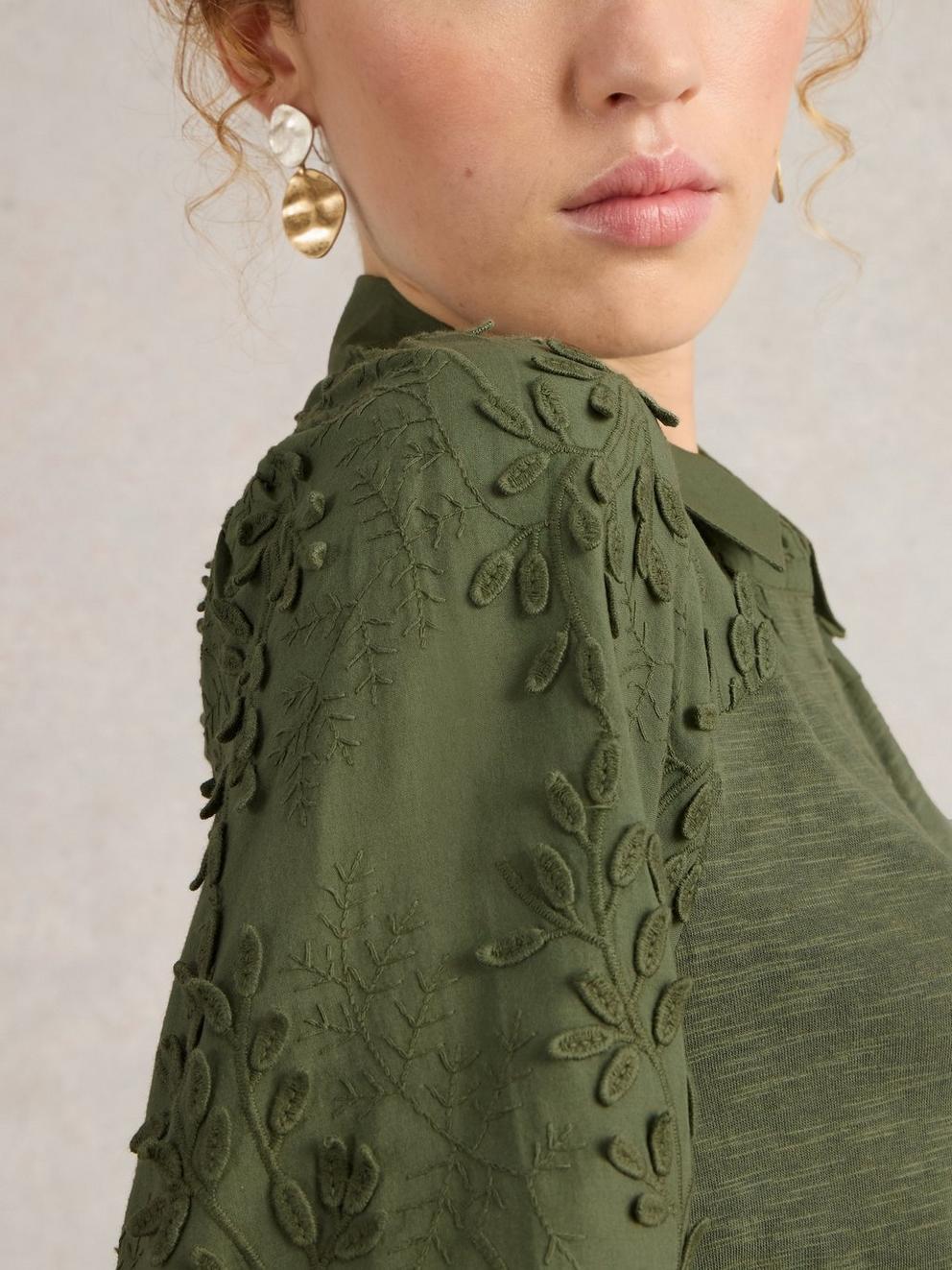 Rua Embroidered Dress in DUS GREEN - MODEL DETAIL