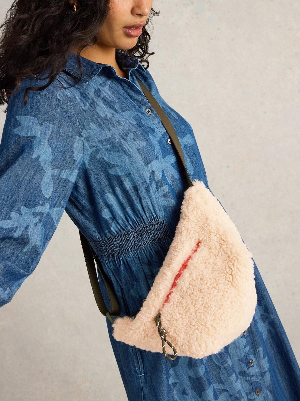 Meadow Borg Crossbody in LGT NAT - MODEL FRONT