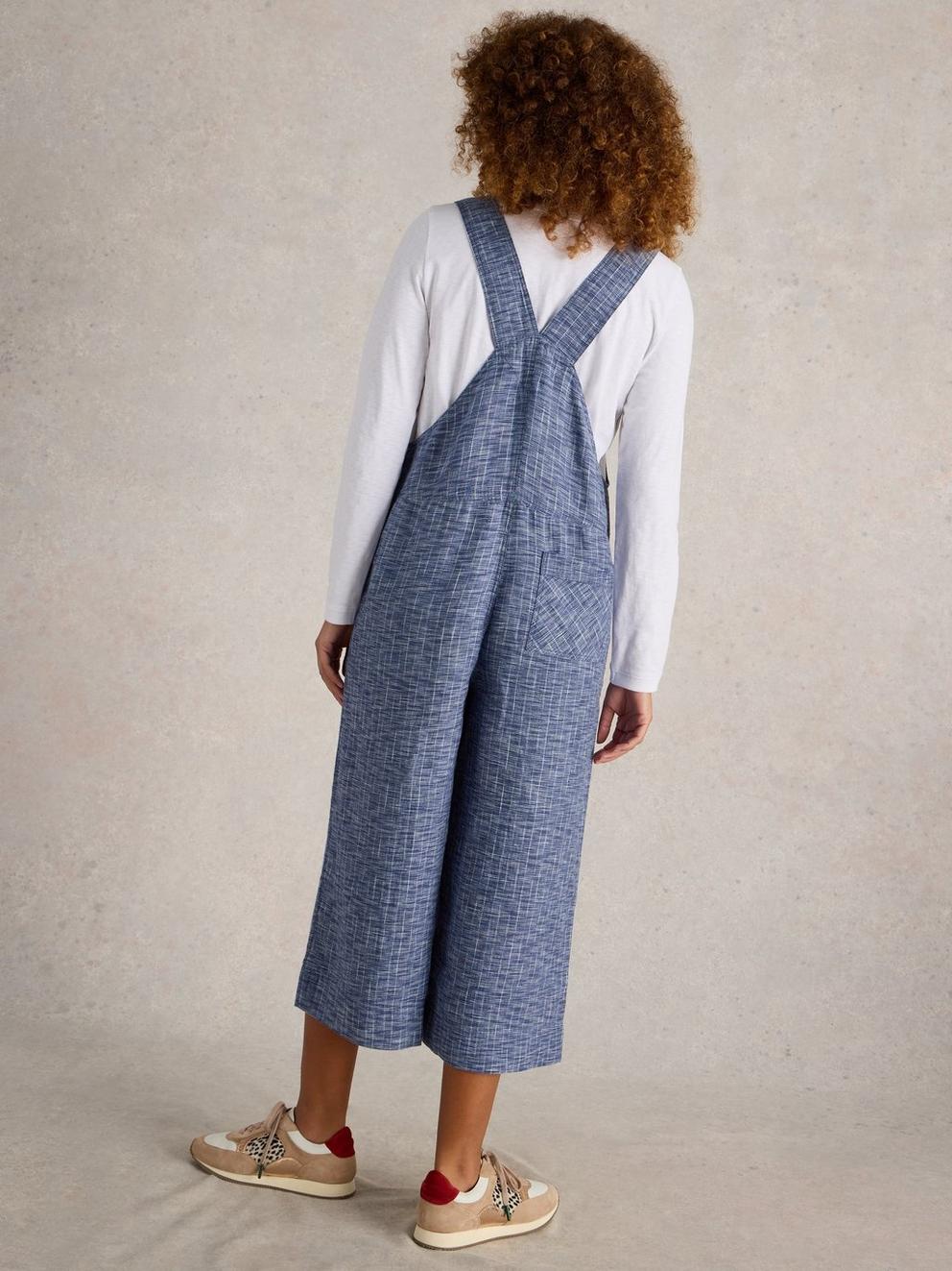 Viola Sleeveless Linen Dungaree in CHAMB BLUE - MODEL BACK