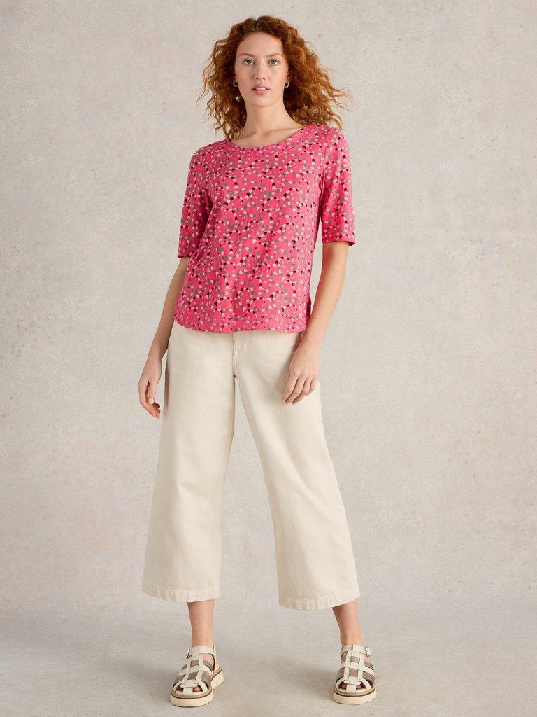 WEAVER JERSEY TEE in CORAL PR - MODEL FRONT