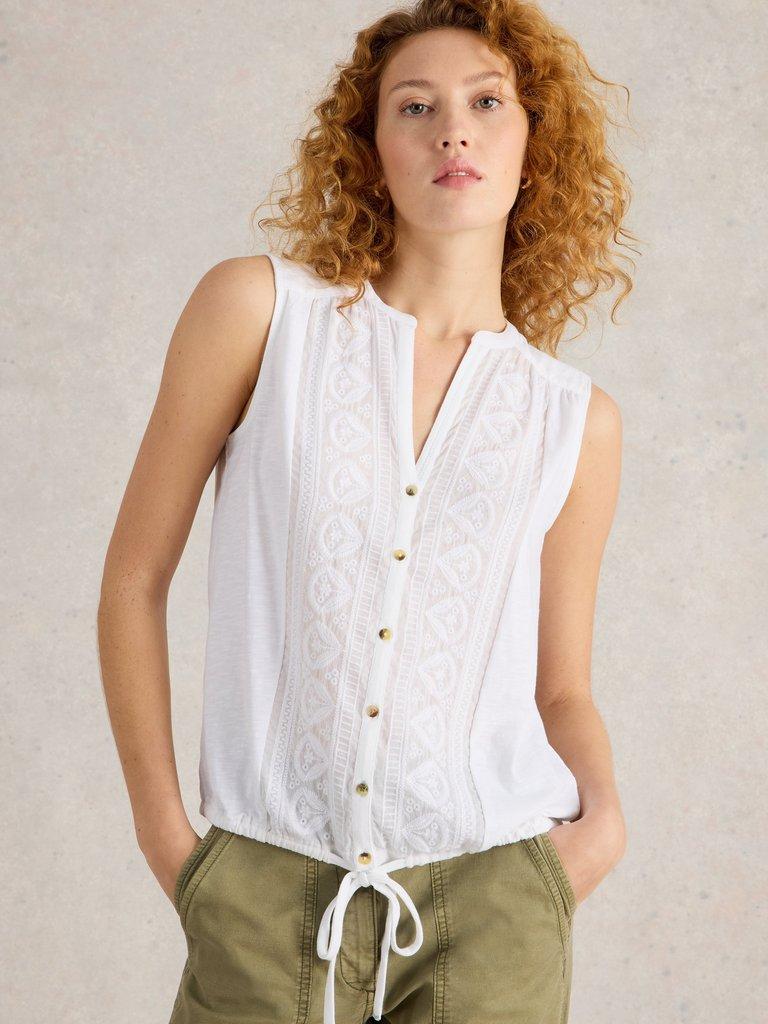 TULIP SLEEVELESS SHIRT in BRIL WHITE - MODEL DETAIL