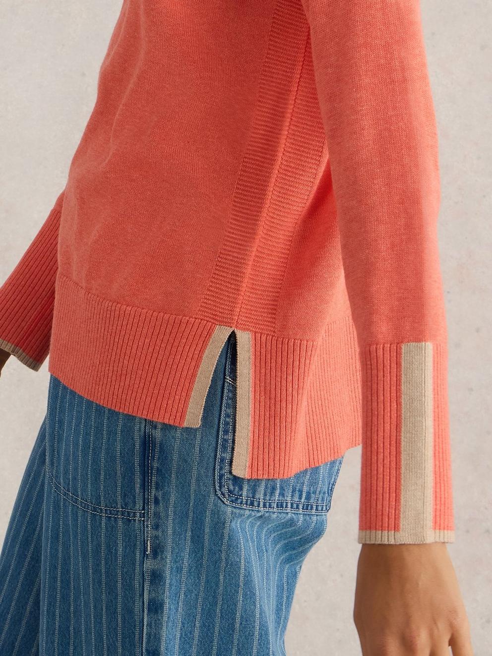 OLIVE LONG SLEEVE JUMPER in MID CORAL - MODEL DETAIL