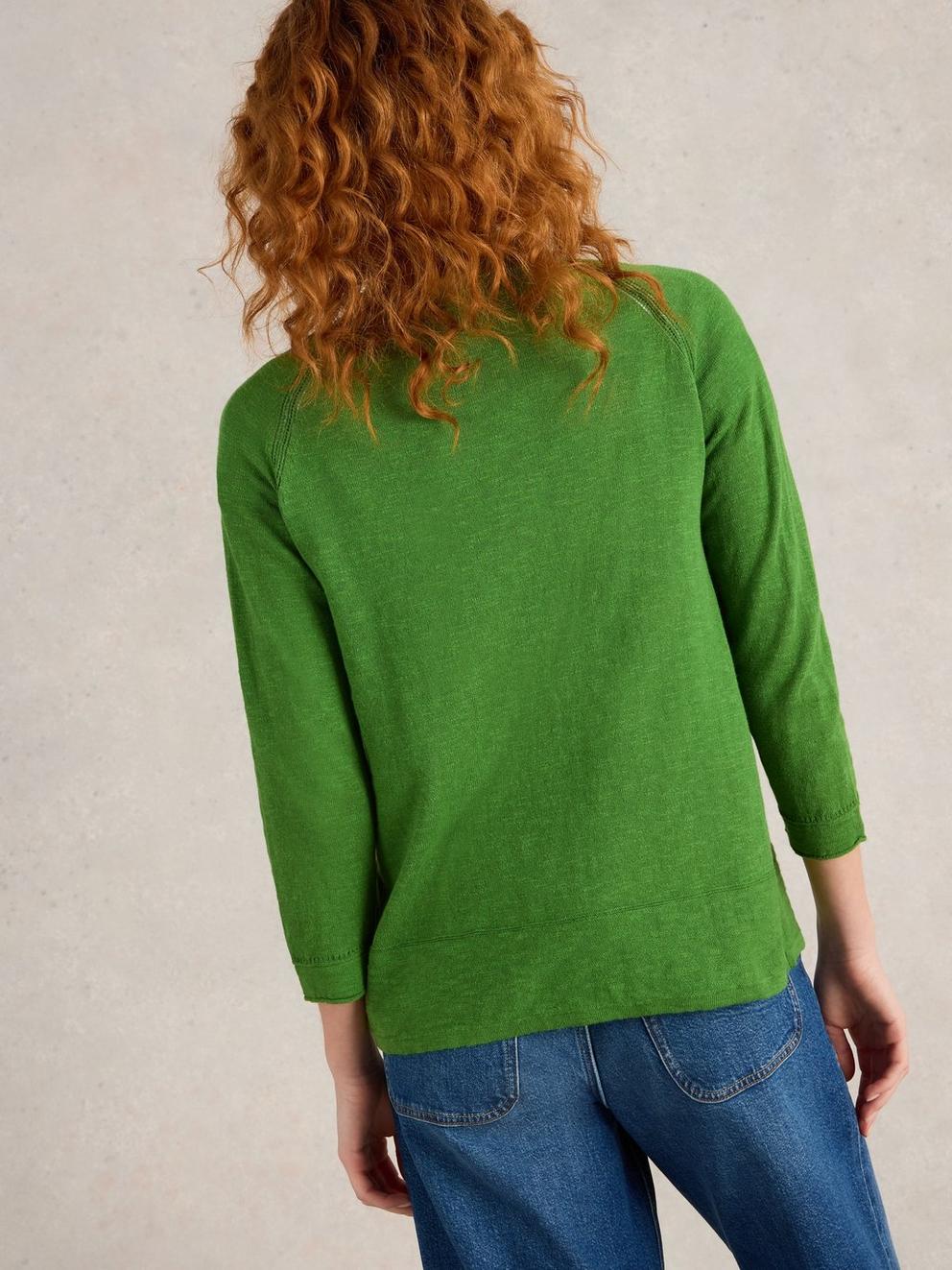 NARIA V NECK CARDI in BRT GREEN - MODEL BACK