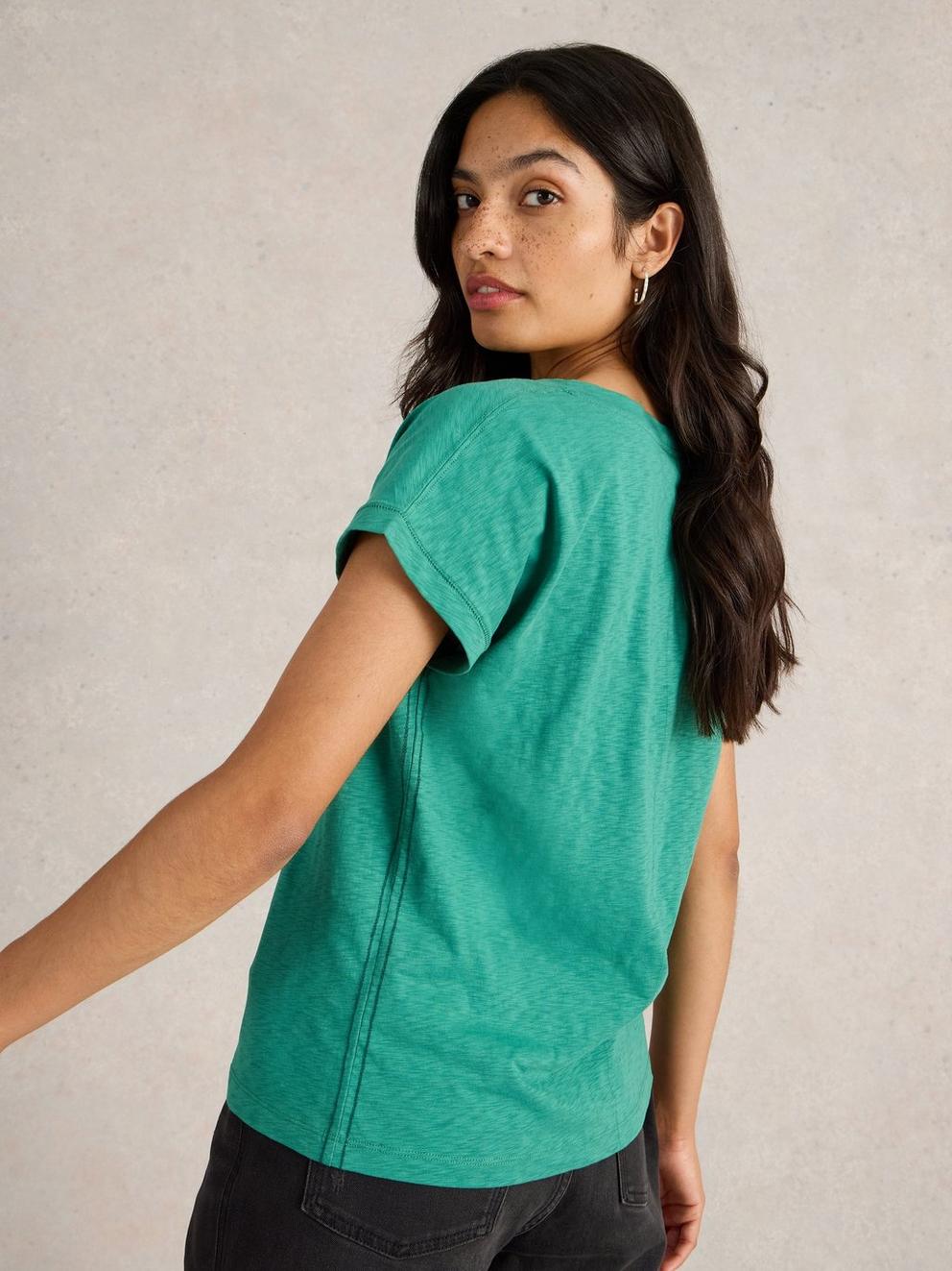 NELLY NOTCH NECK T-SHIRT in DUS GREEN - MODEL BACK