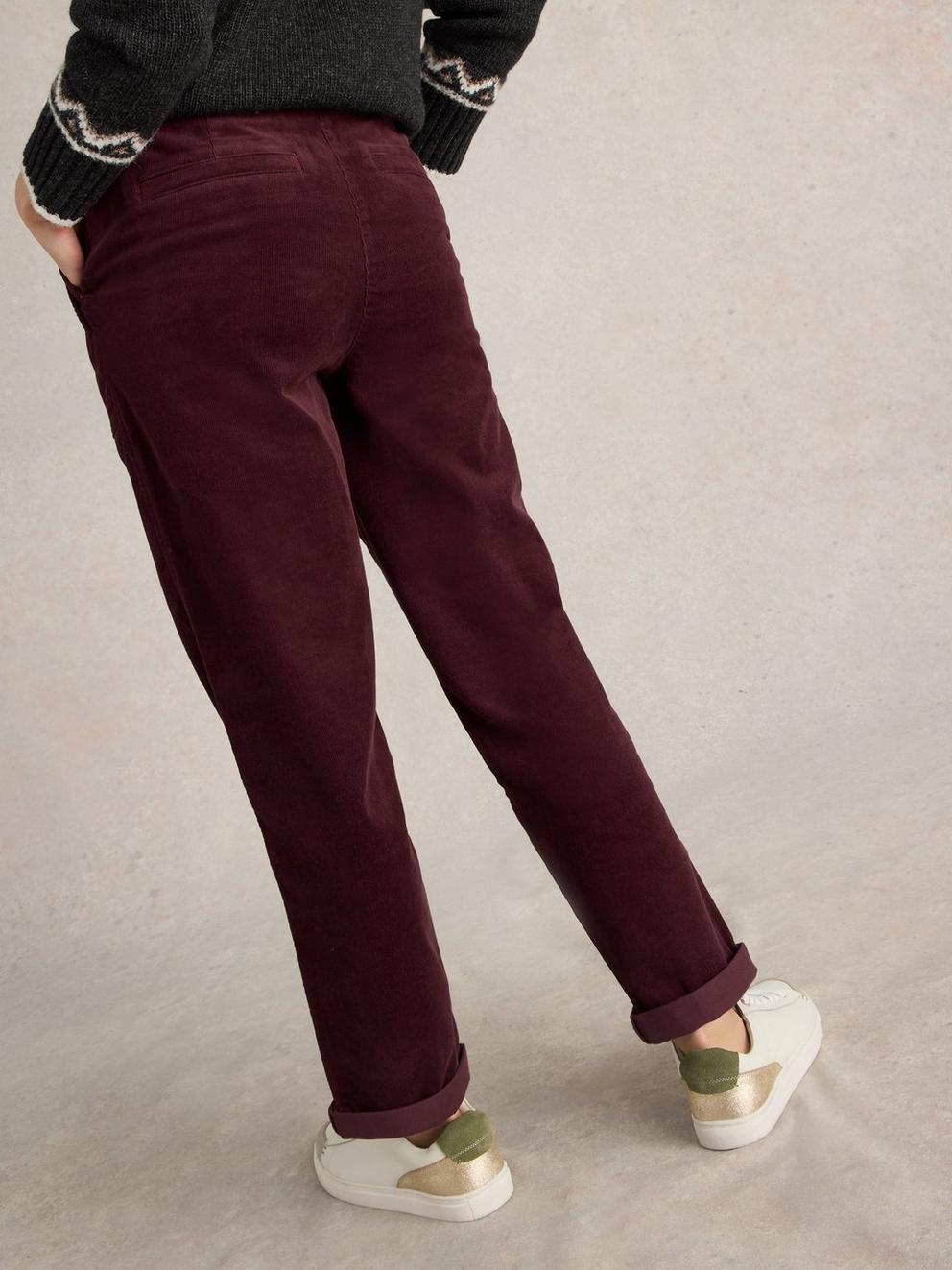 Twister Full Length Cord Trouser in MID PLUM - MODEL BACK