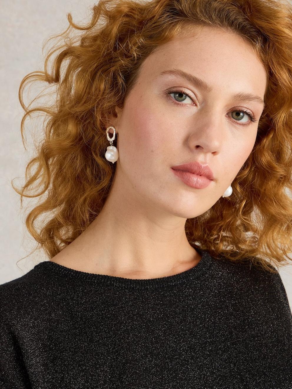 Pearl Drop Earring in SLV TN MET - MODEL FRONT