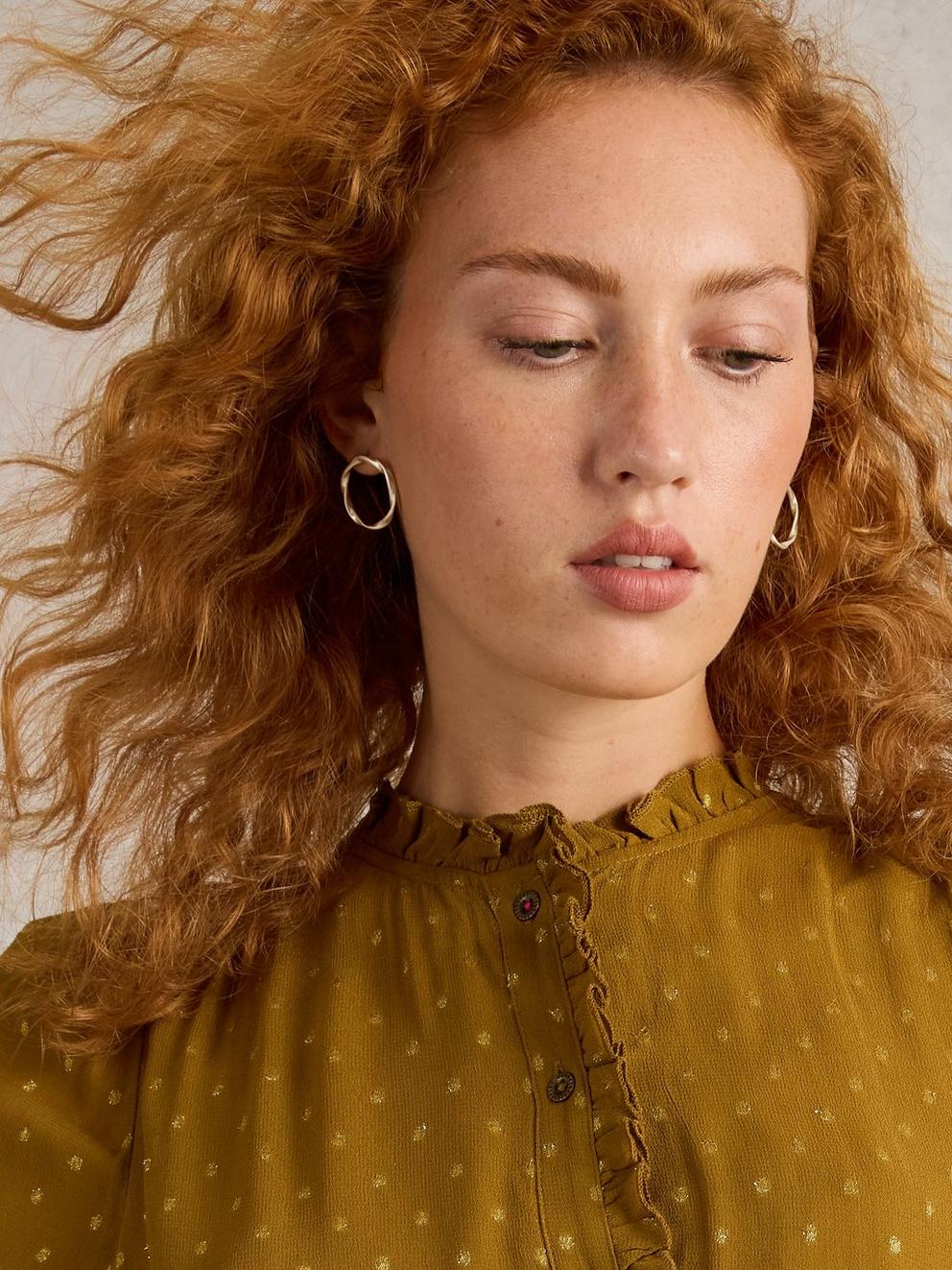 Cynthia Earring Round in GLD TN MET - MODEL FRONT