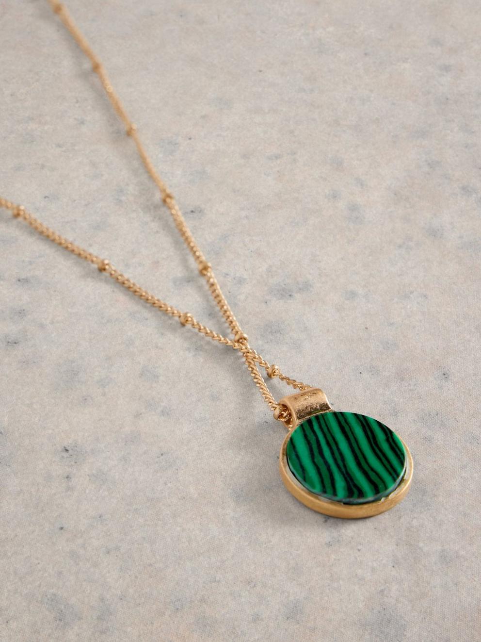 Green single stone necklace in GLD TN MET - FLAT DETAIL