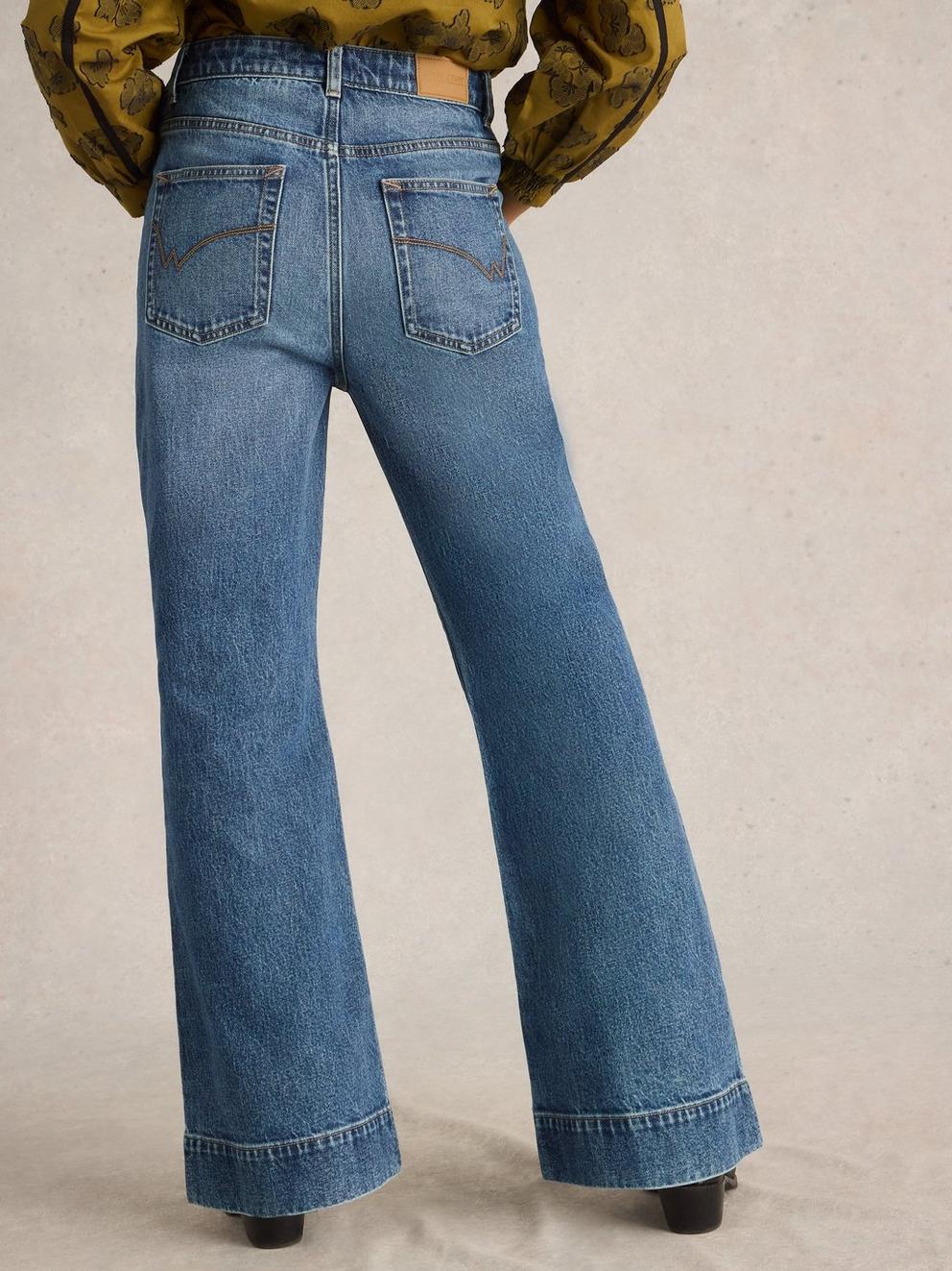 Frankie Flare Jean in MID DENIM - MODEL BACK