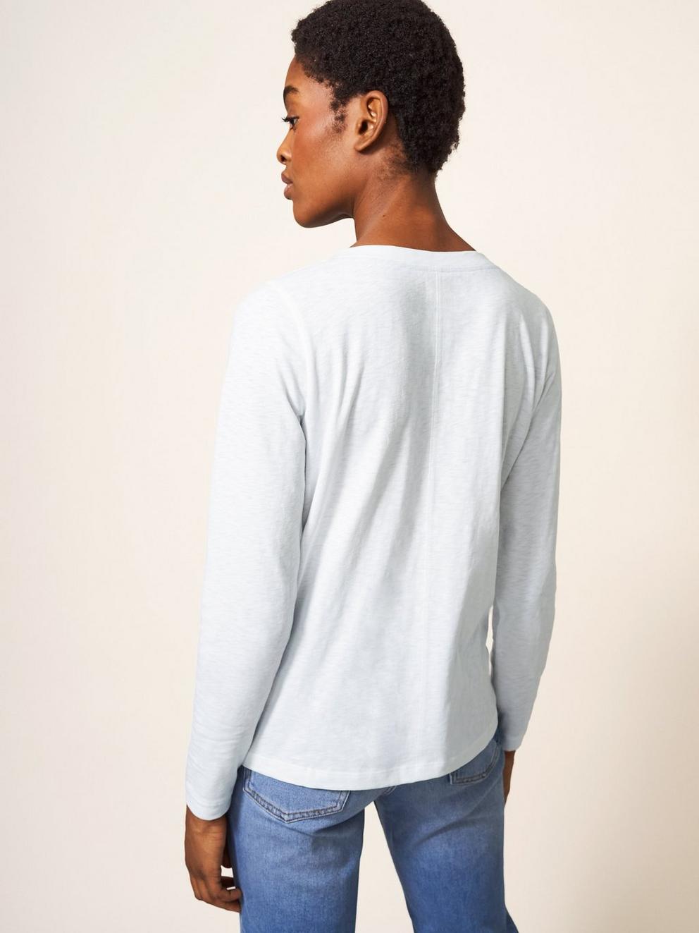 NELLY LONG SLEEVE NOTCH NECK TEE in BRIL WHITE - MODEL BACK
