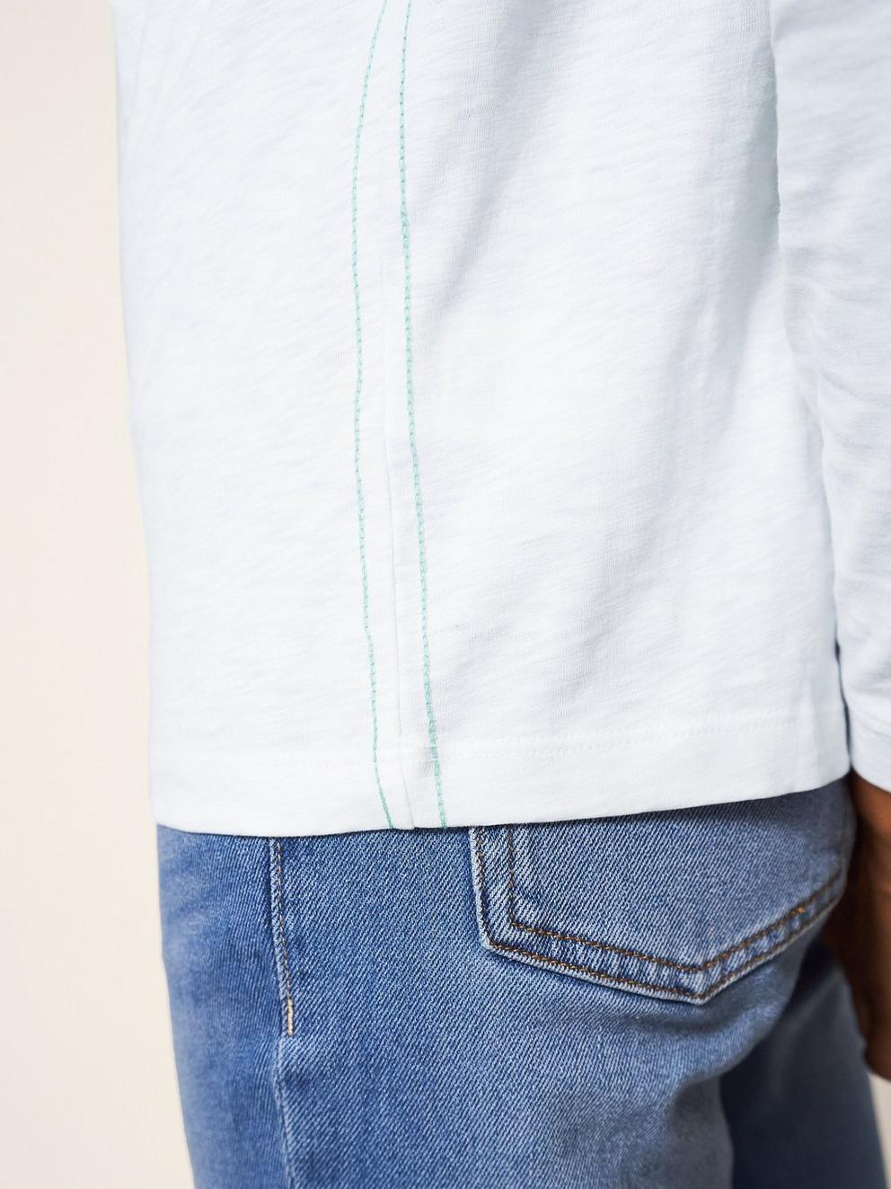 NELLY LONG SLEEVE NOTCH NECK TEE in BRIL WHITE - MODEL DETAIL