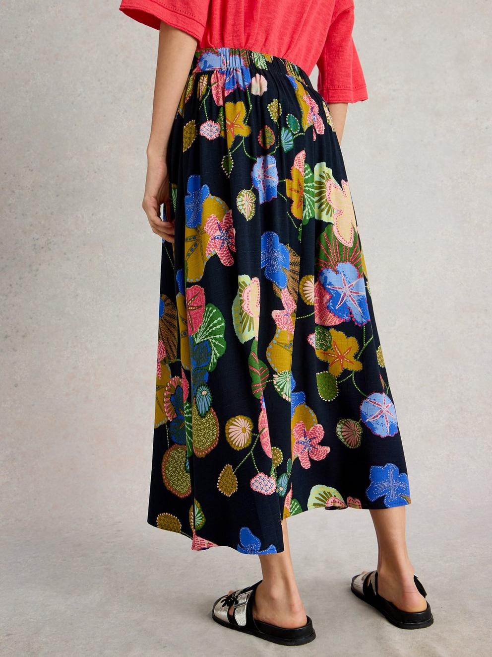 Abigail Print Midi Skirt in NAVY PR - MODEL BACK