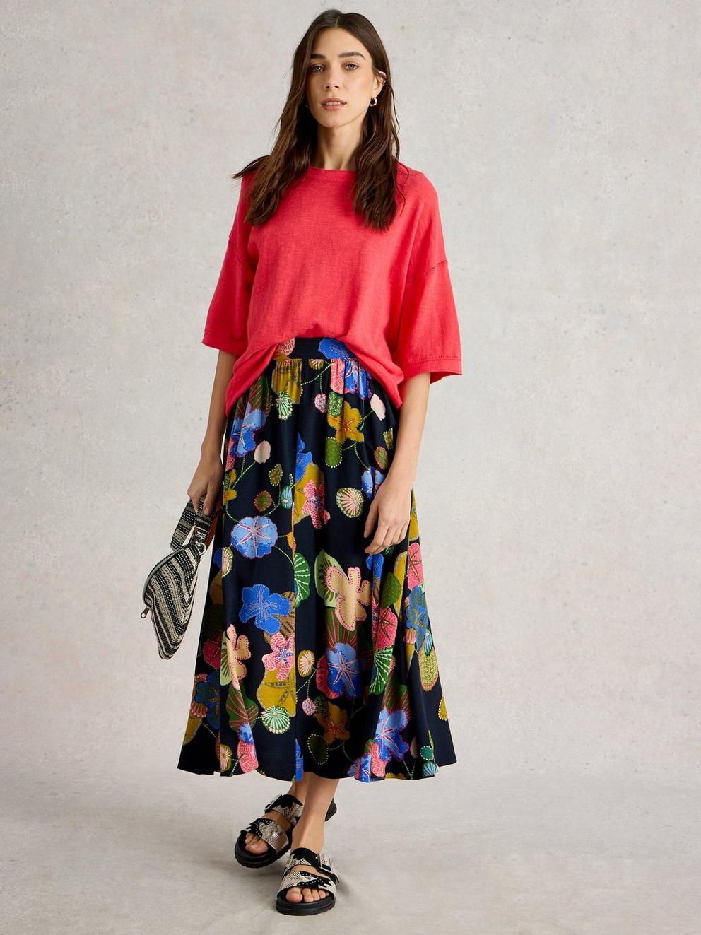 Abigail Print Midi Skirt in NAVY PR - MODEL FRONT