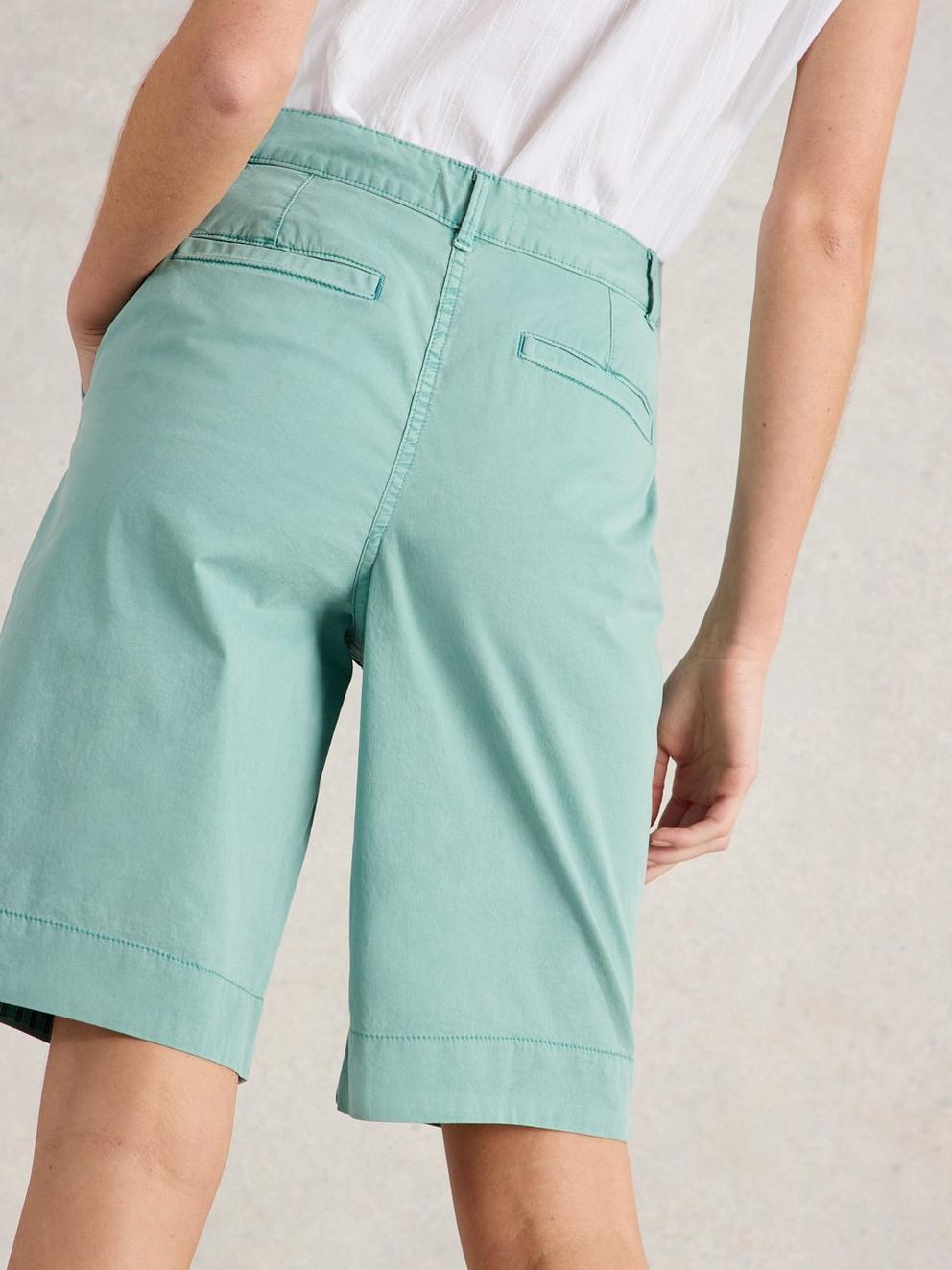 Hayley Organic Chino Short in MID TEAL - MODEL BACK