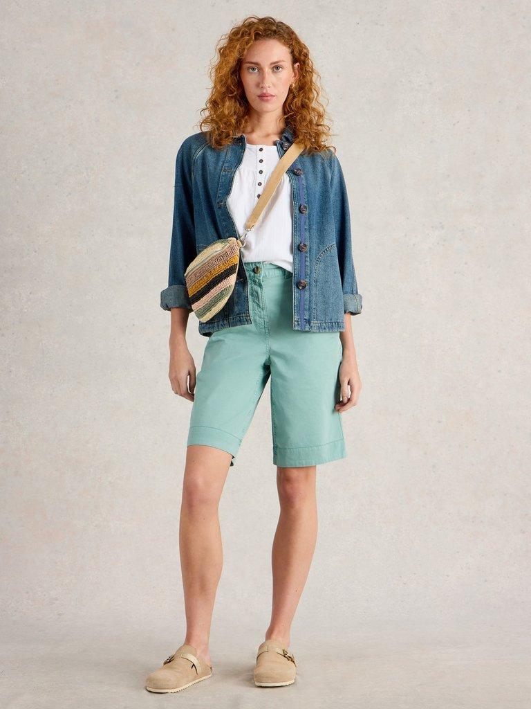 Hayley Organic Chino Short in MID TEAL - MODEL FRONT