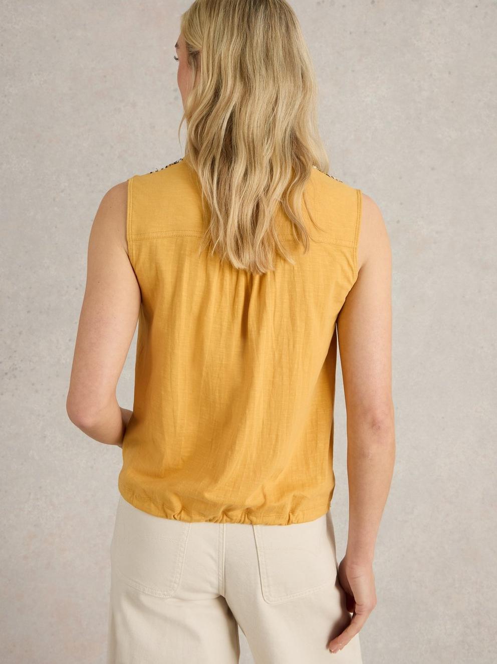 TULIP MIX SLEEVELESS SHIRT in MID YELLOW - MODEL BACK