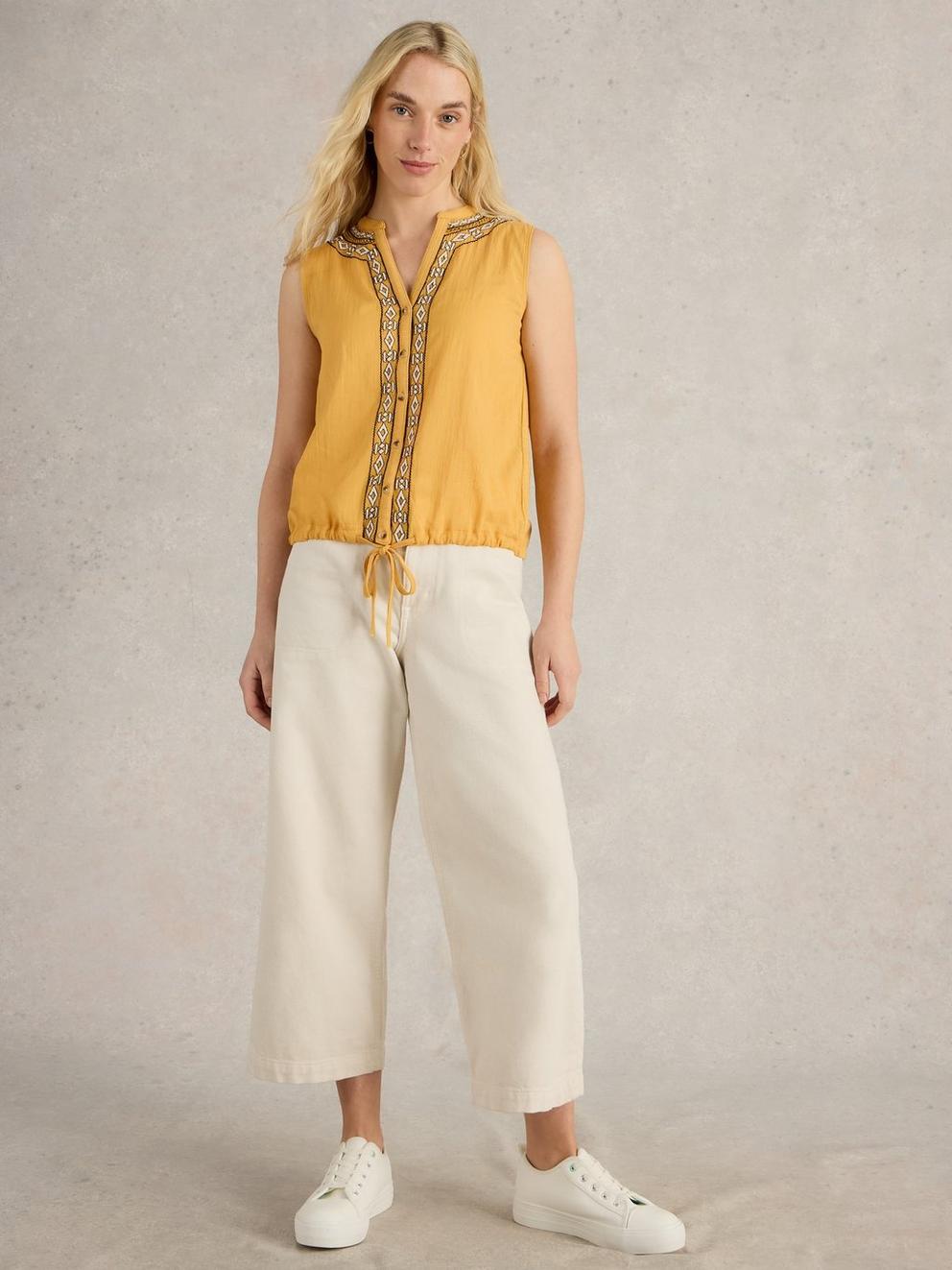 TULIP MIX SLEEVELESS SHIRT in MID YELLOW - MODEL FRONT