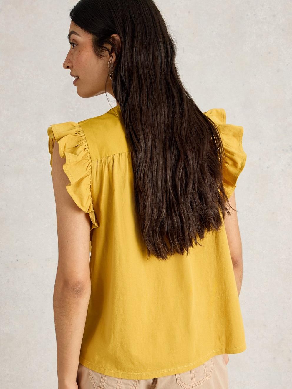 CALLIE FRILL TOP in MID YELLOW - MODEL BACK