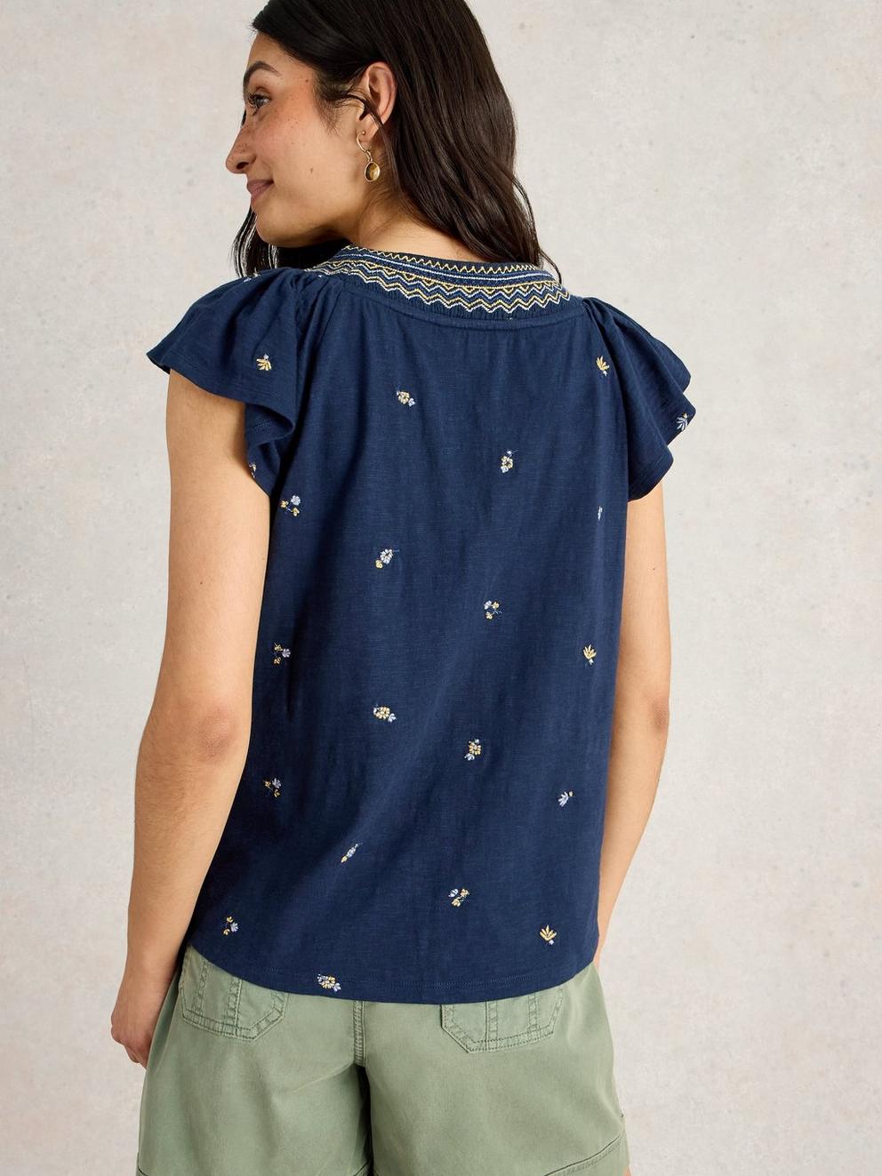 LUCIE EMBROIDERED TOP in NAVY MULTI - MODEL BACK