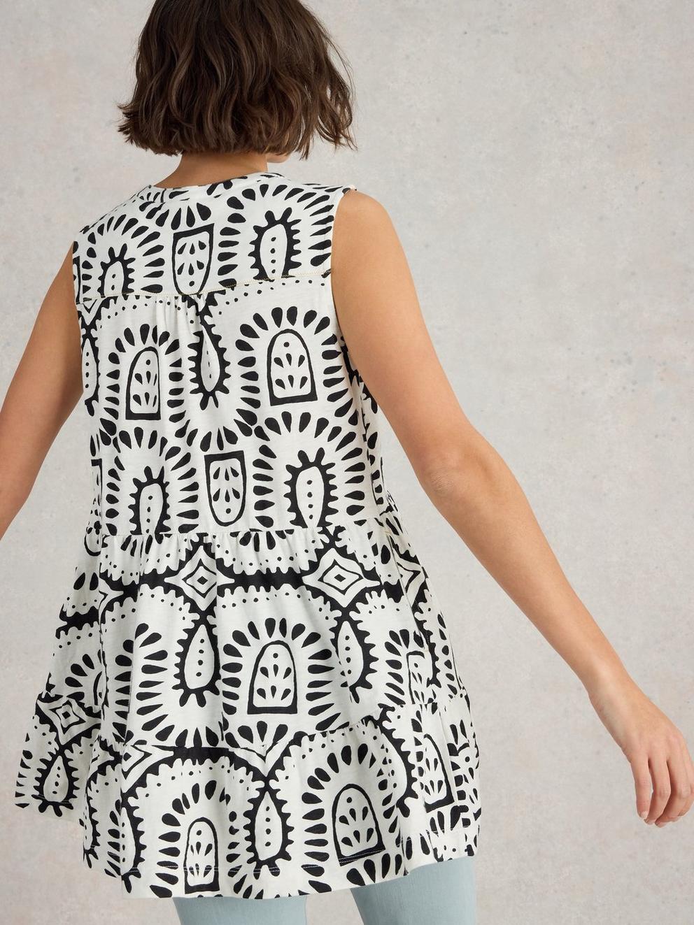 MACIE SLEEVELESS NOTCH NECK TUNIC in IVORY PR - MODEL BACK