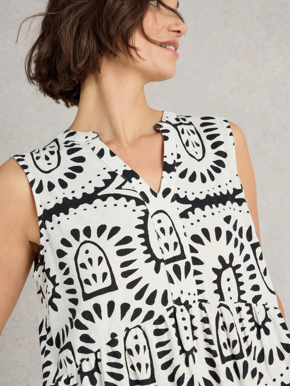 MACIE SLEEVELESS NOTCH NECK TUNIC in IVORY PR - MODEL DETAIL