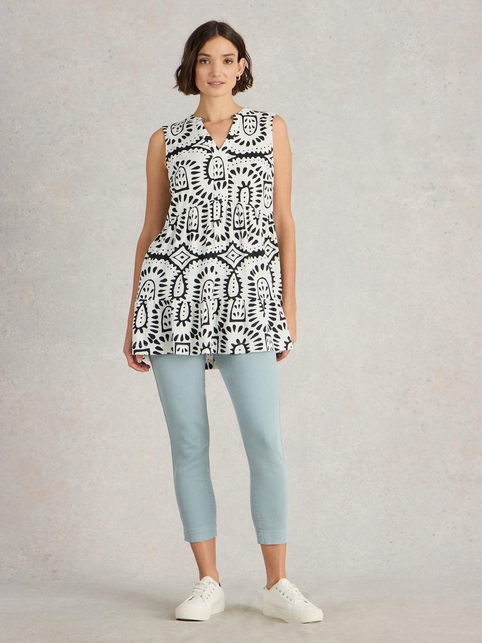 MACIE SLEEVELESS NOTCH NECK TUNIC in IVORY PR - MODEL FRONT