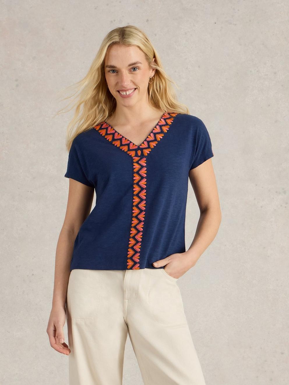 NEVA EMBROIDERED V NECK TOP in NAVY MULTI - MODEL DETAIL