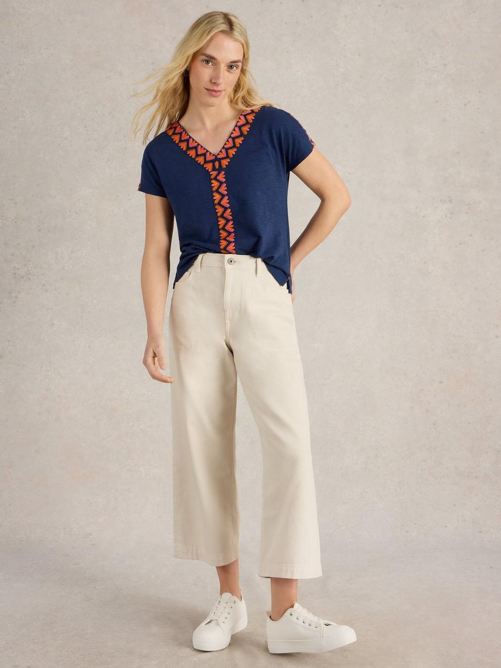 NEVA EMBROIDERED V NECK TOP in NAVY MULTI - MODEL FRONT