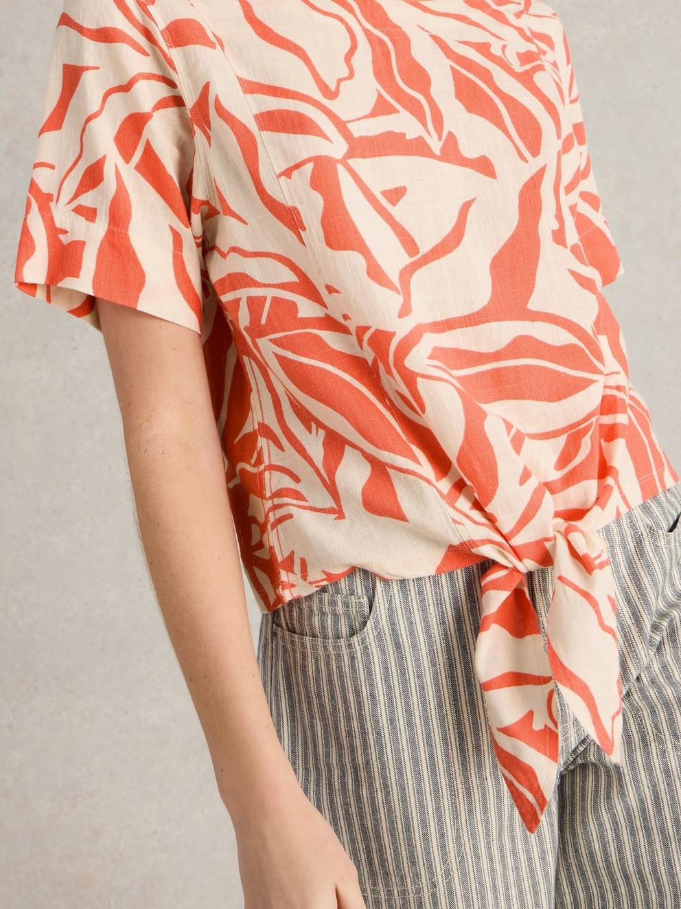 SARA CREW NECK TIE HEM TOP in CORAL PR - MODEL DETAIL