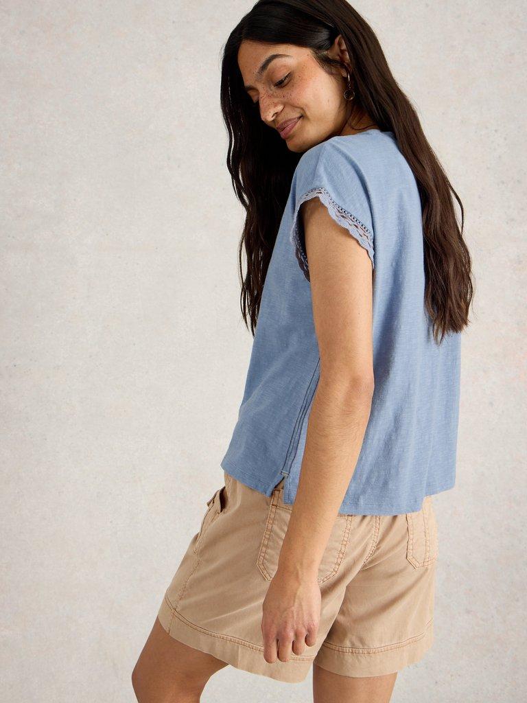 CLAUDIA TRIM TEE in MID BLUE - MODEL BACK