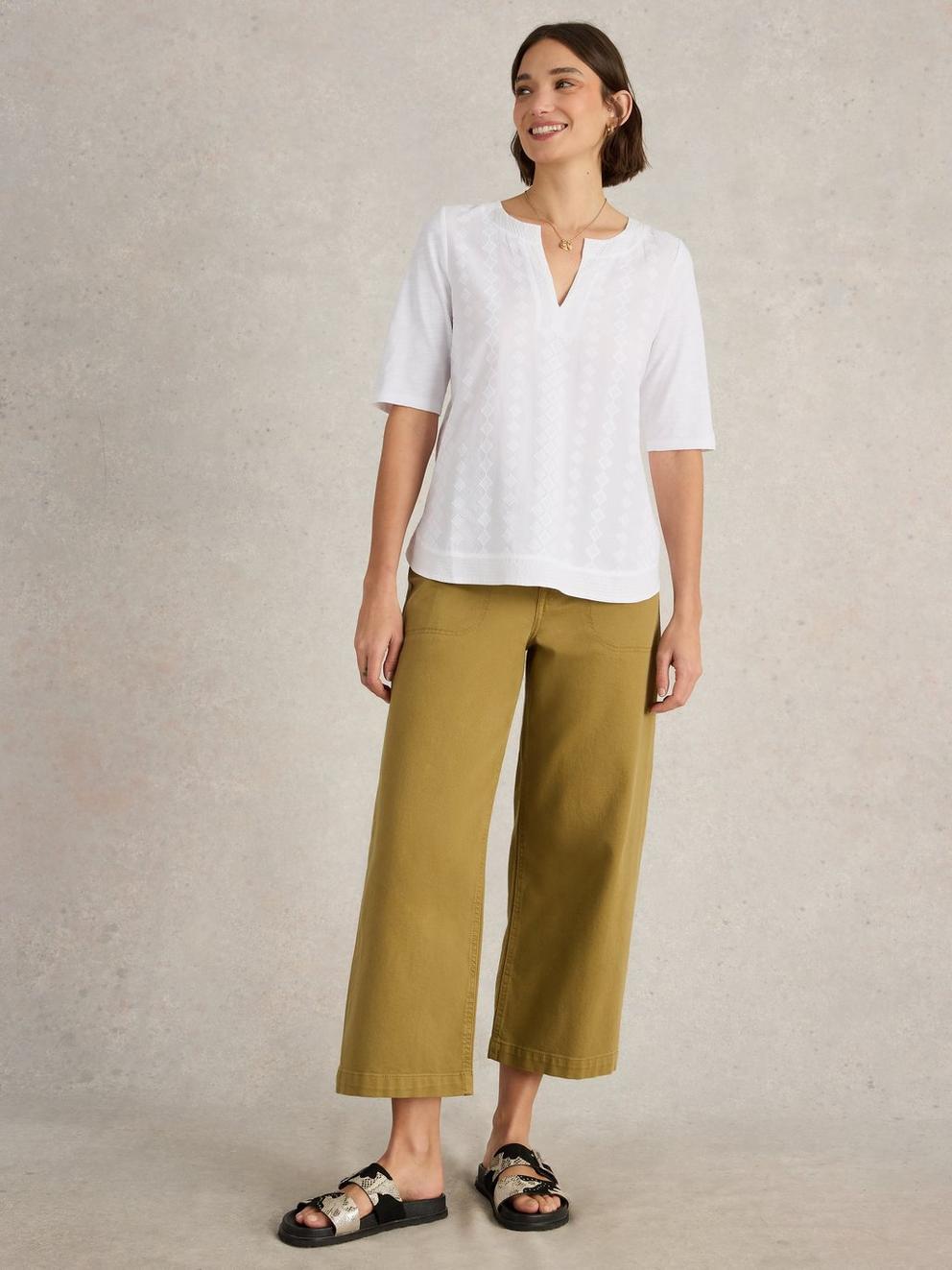 WEAVER NOTCH NECK TOP in BRIL WHITE - MODEL FRONT