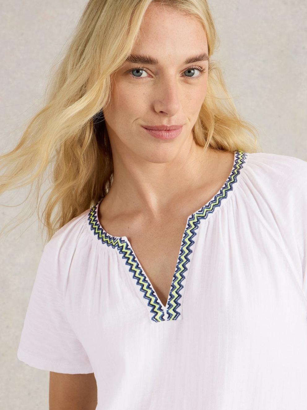 LUCIA EMBROIDERED TOP in WHITE MLT - MODEL DETAIL