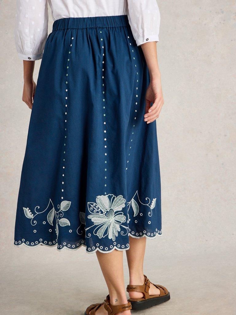 Calypso Embroidered Skirt in DK BLUE - MODEL BACK