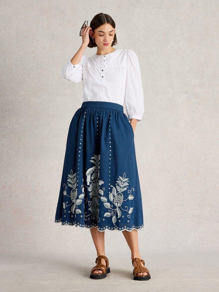 Calypso Embroidered Skirt in DK BLUE - MODEL FRONT