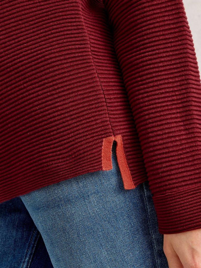 JANA LONG SLEEVE JUMPER in DEEP RED - MODEL DETAIL
