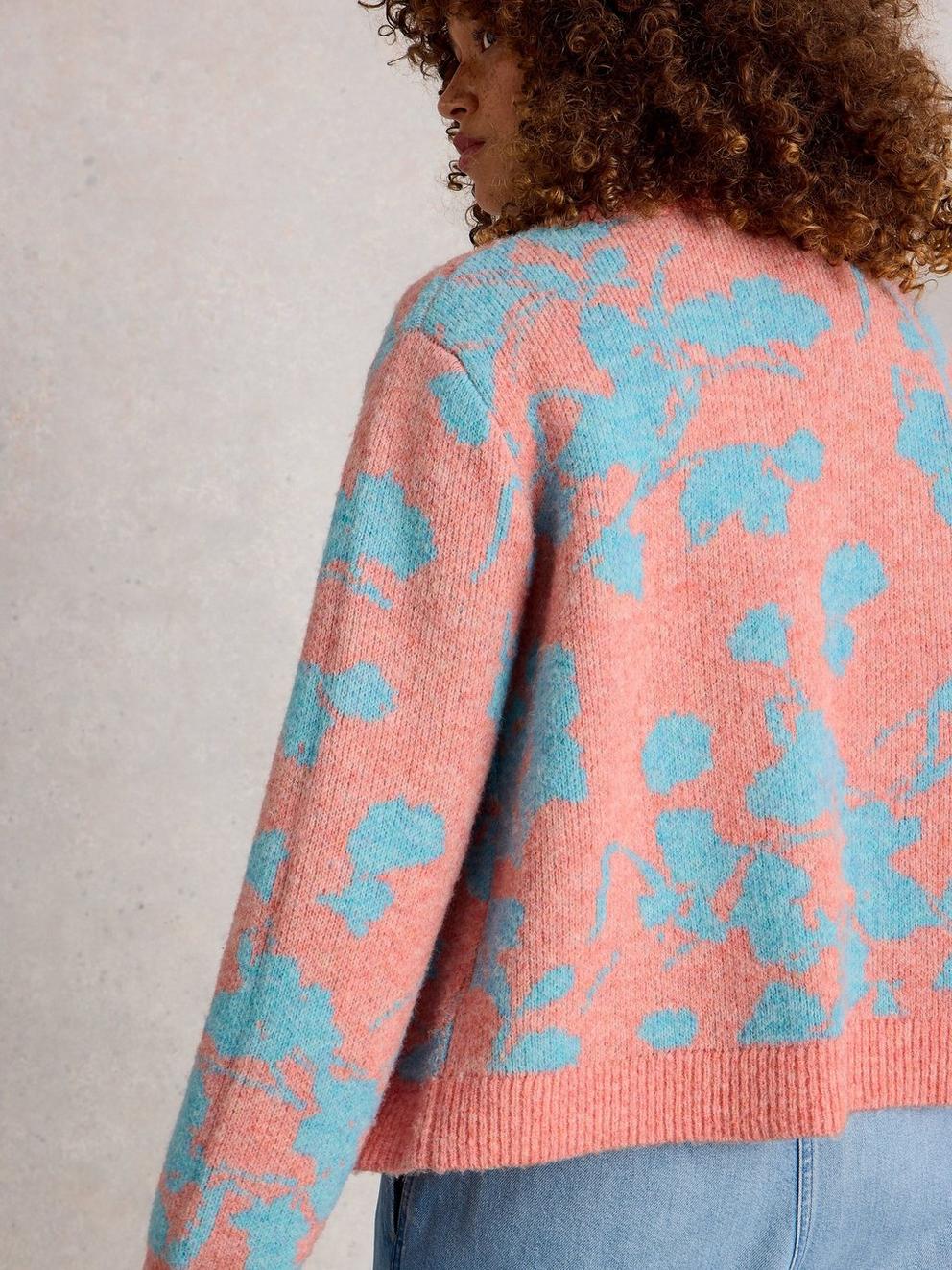 JENNY FLORAL CARDI in CORAL MLT - MODEL BACK
