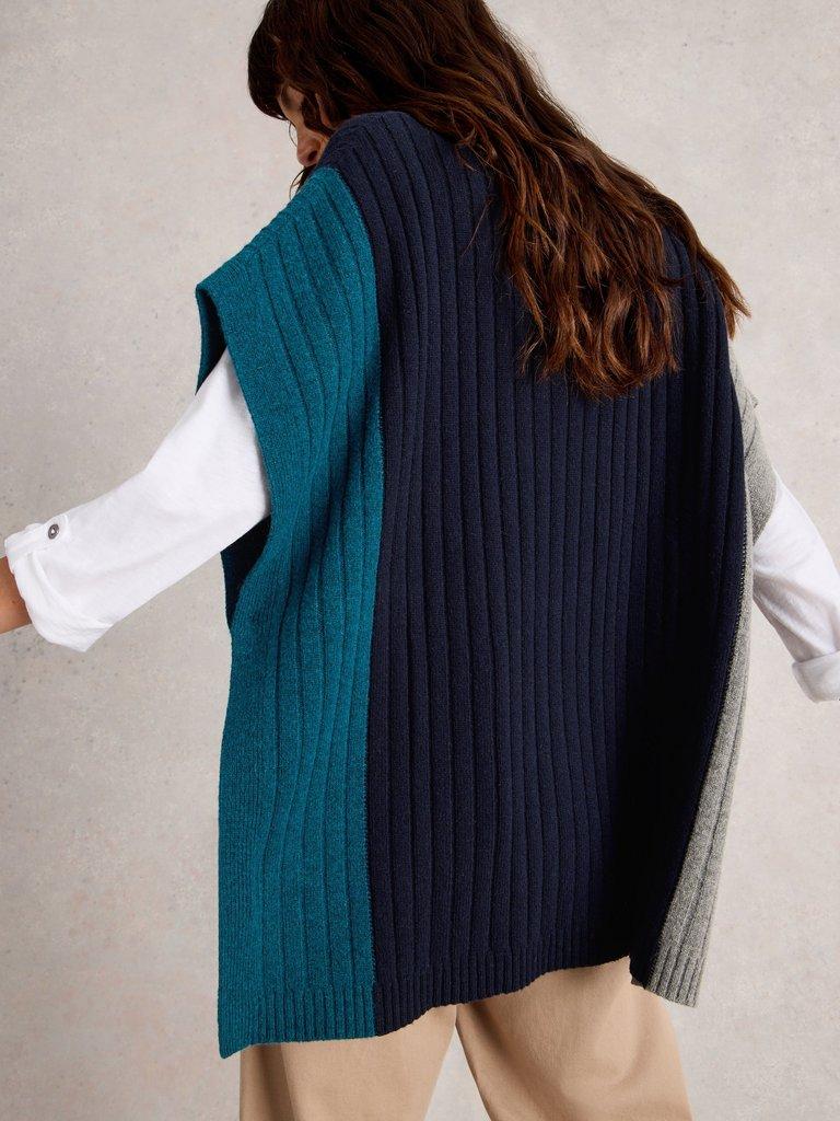 Ava Knitted Poncho in NAVY MULTI - MODEL BACK