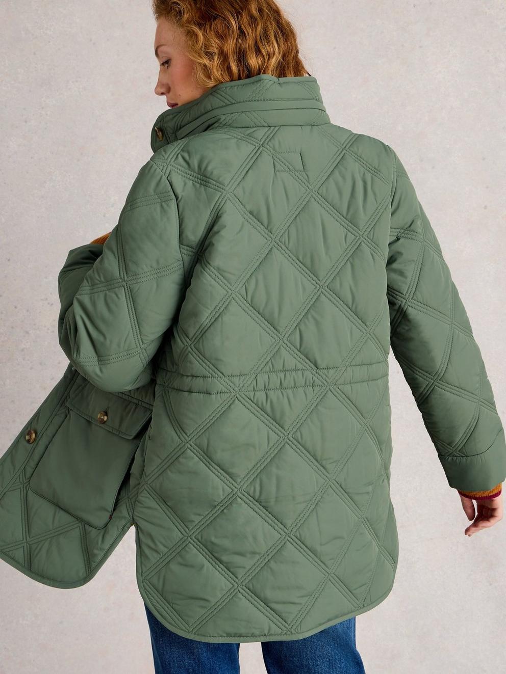 Edie Quilted Coat in DUS GREEN - MODEL BACK