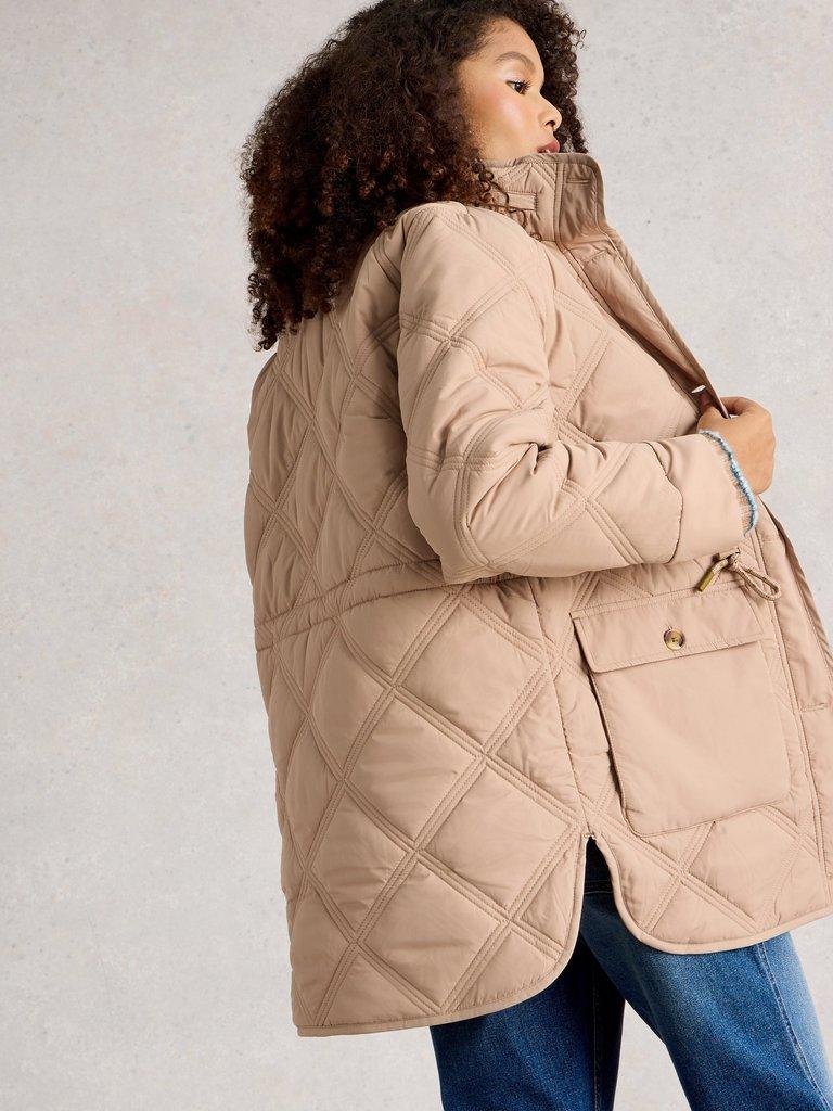 Edie Quilted Coat in LGT NAT - MODEL BACK