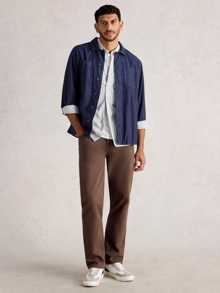 Garment Dye Eastwood Jean in MID BROWN - MODEL FRONT