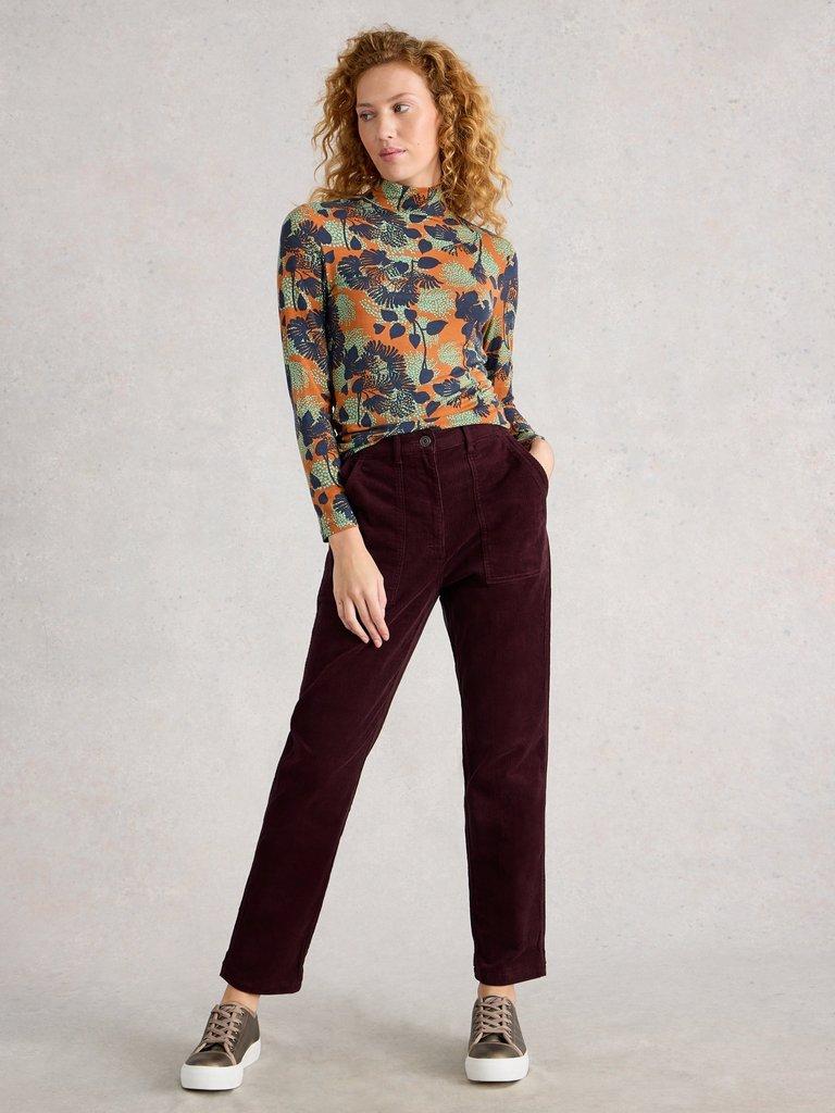 Womens Twister Cord Trouser in DK PLUM - MODEL FRONT