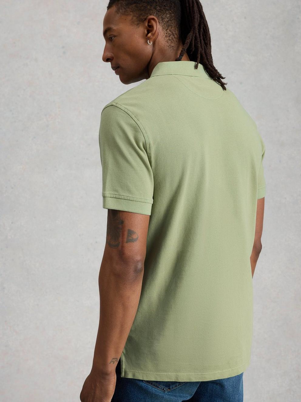 Utility Short Sleeve Polo in LGT GREEN - MODEL BACK