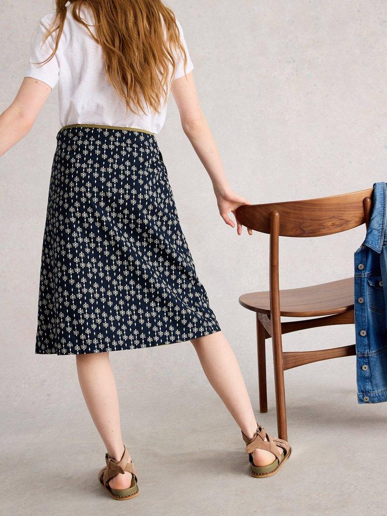 Nell Knee Length Reversible Skirt in NAVY MULTI - MODEL BACK