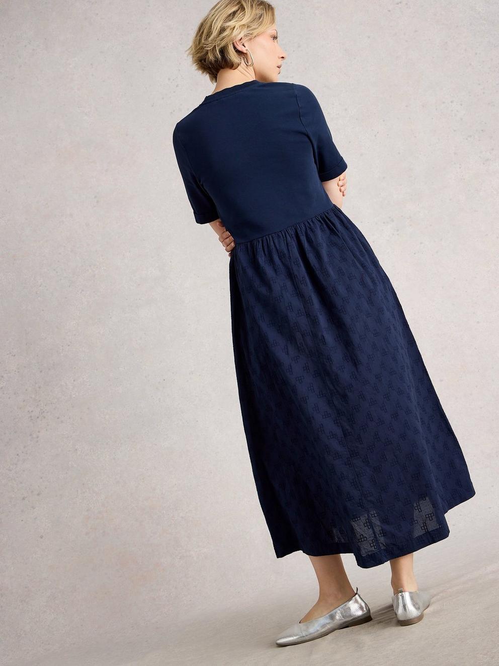 Vera Broderie Dress in DARK NAVY - MODEL BACK