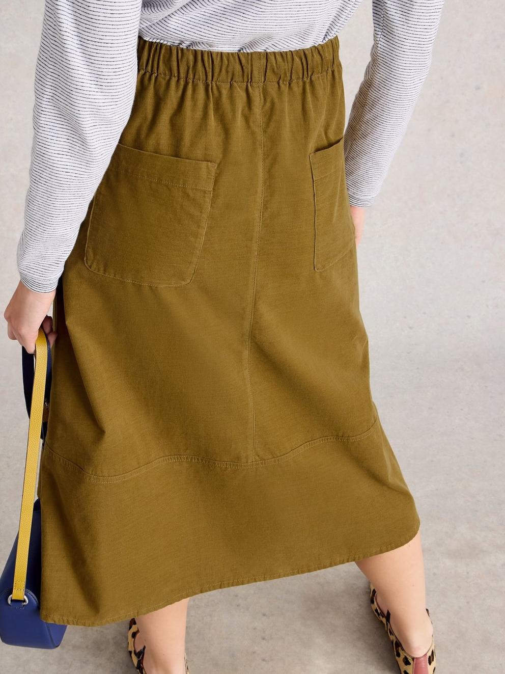 Tilly Cord Midi Skirt in KHAKI GRN - MODEL BACK