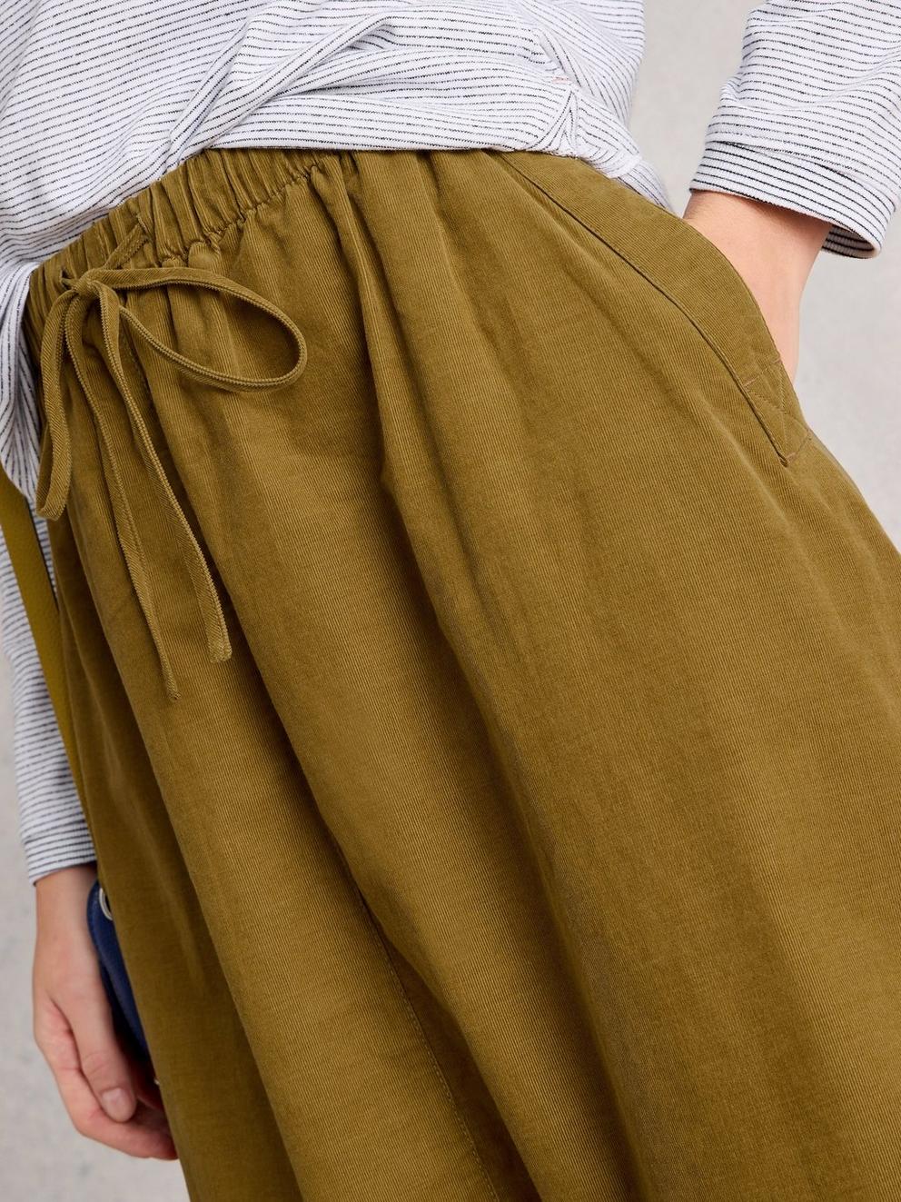 Tilly Cord Midi Skirt in KHAKI GRN - MODEL DETAIL