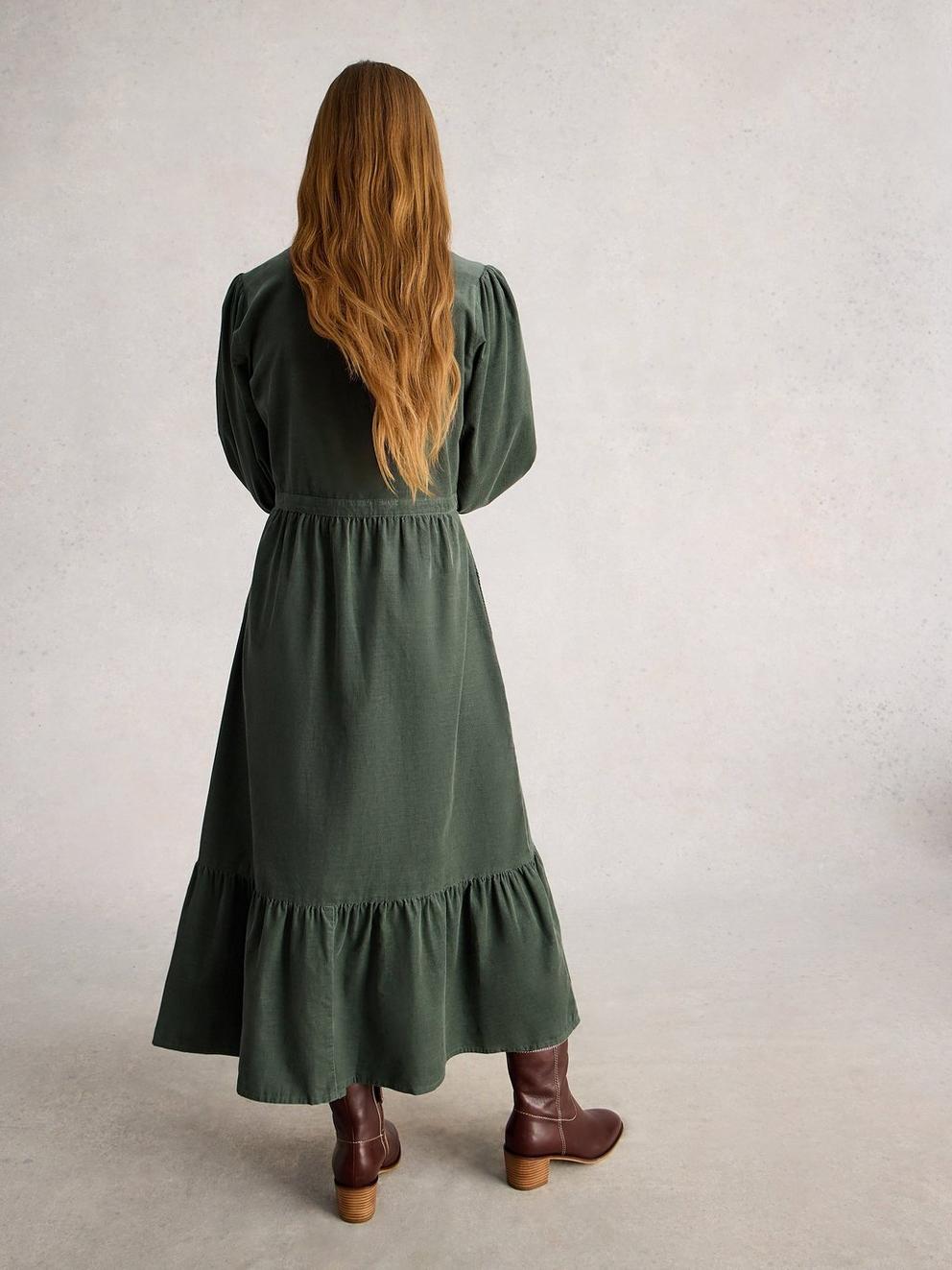 Phoebe Cord Dress in DUS GREEN - MODEL BACK